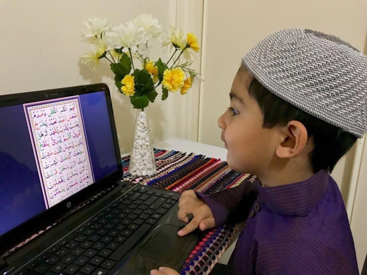 A kid having online quran class
